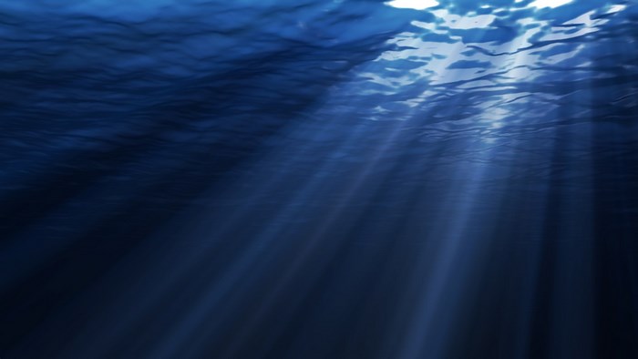 Underwater scene with sunbeams