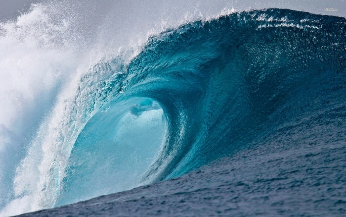 Crashing ocean wave with spray