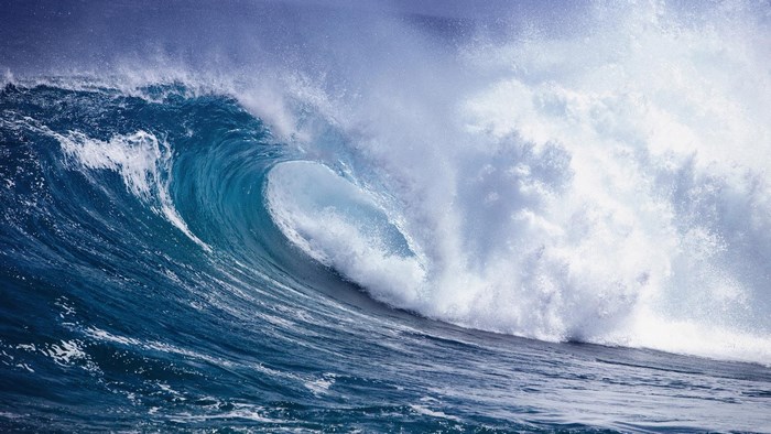 Crashing ocean wave with white foam