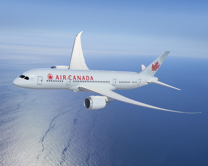 Air Canada Boeing 787 Dreamliner flying over the ocean