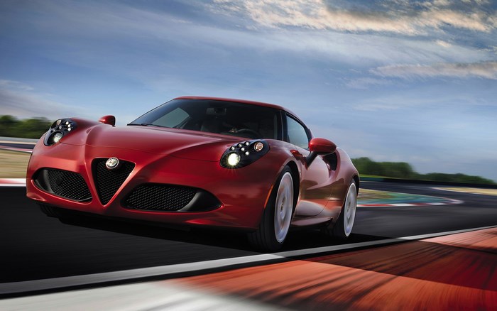 Red Alfa Romeo 4C on a Racetrack