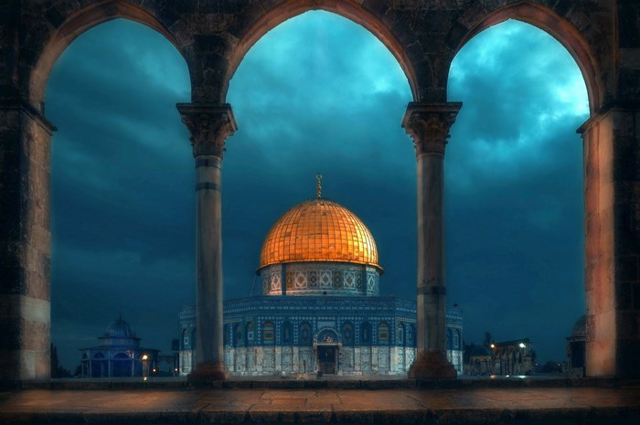Dome of the Rock mosque through arches