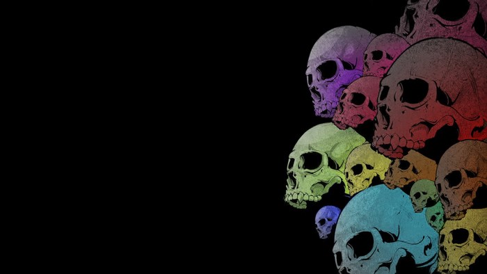 Colorful skulls on a black background