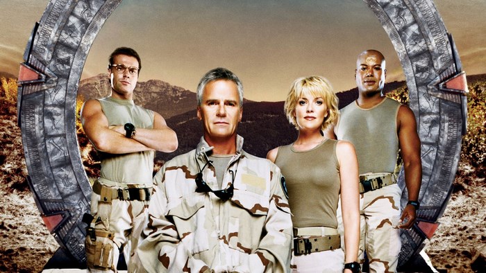 Stargate SG-1 characters in front of Stargate
