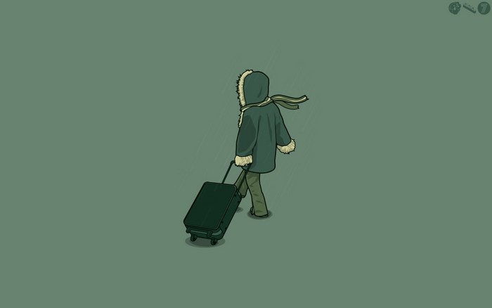 Person with suitcase in the rain