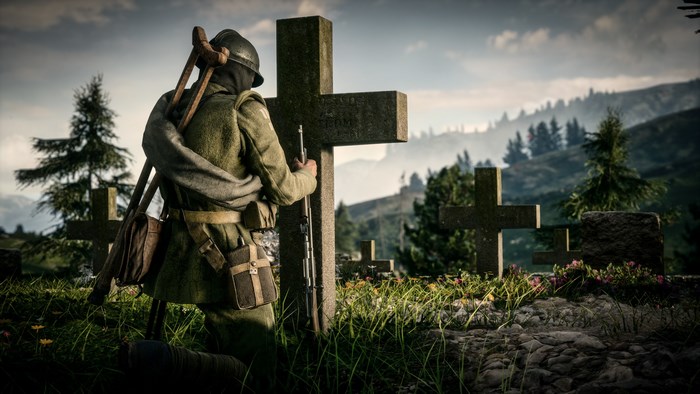 Soldier kneeling at a grave in Battlefield 1