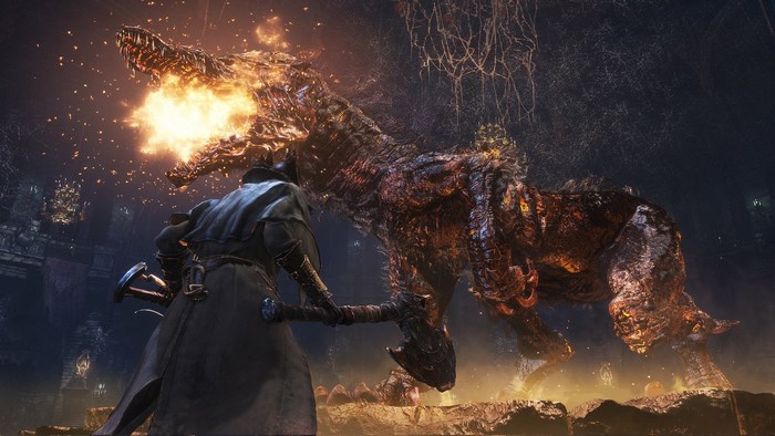 Hunter fighting a fiery beast in Bloodborne