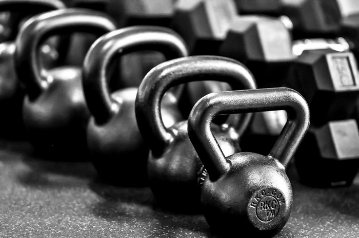 Kettlebells and Dumbbells in a Gym