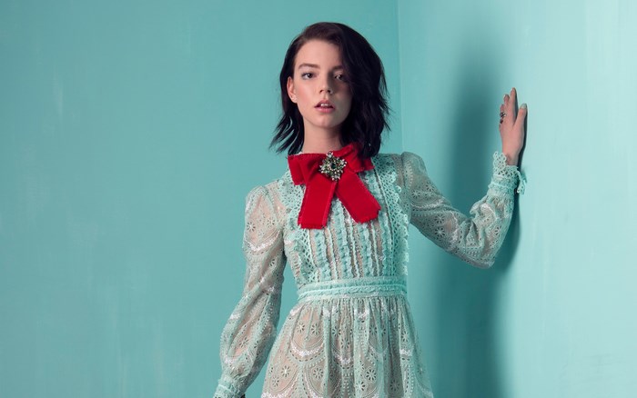 Anya Taylor-Joy in a light blue lace dress