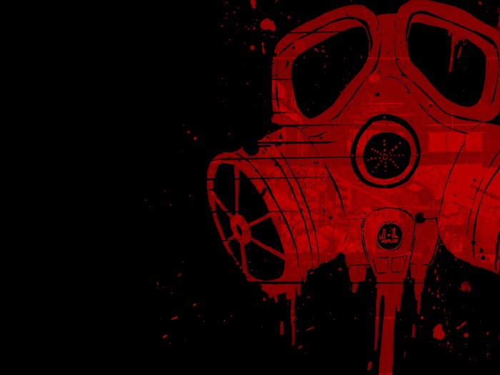 Red gas mask with black background