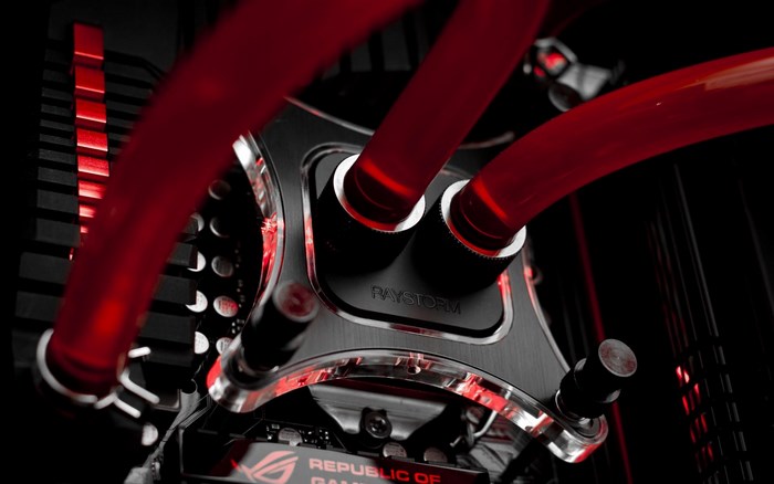 Custom PC water cooling system with red tubes