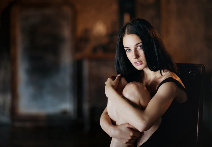 Woman sitting in a chair