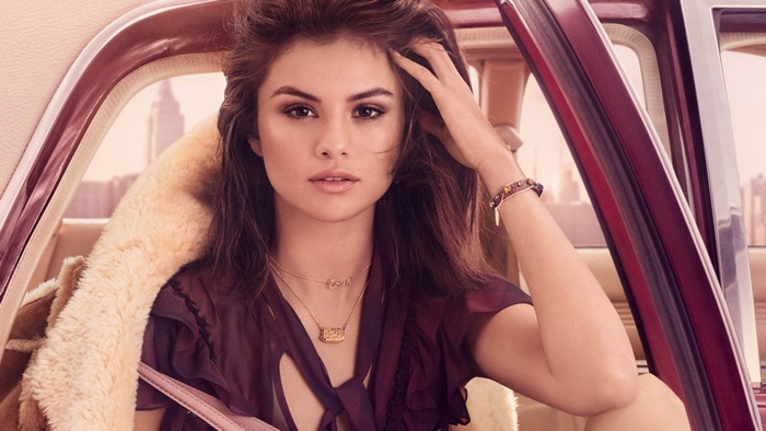 Selena Gomez in a car