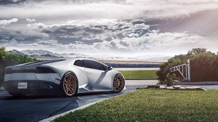 White Lamborghini Huracan on a cloudy day