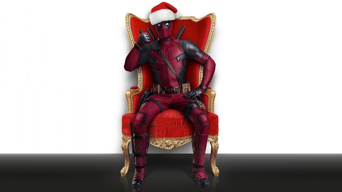Deadpool in Santa Hat Sitting on Throne 4K