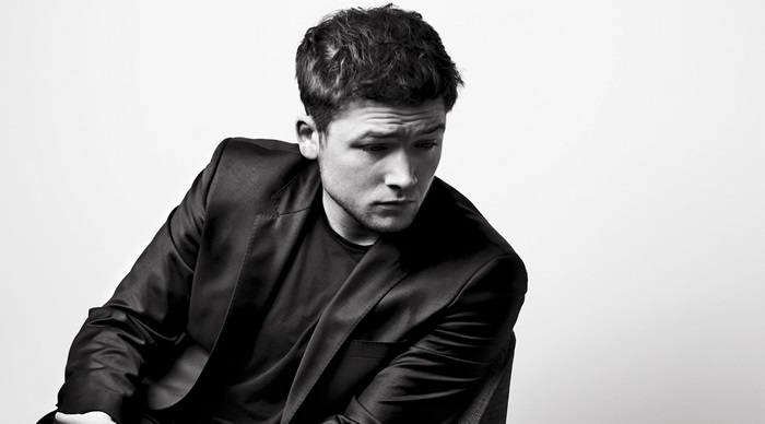 Taron Egerton in a suit