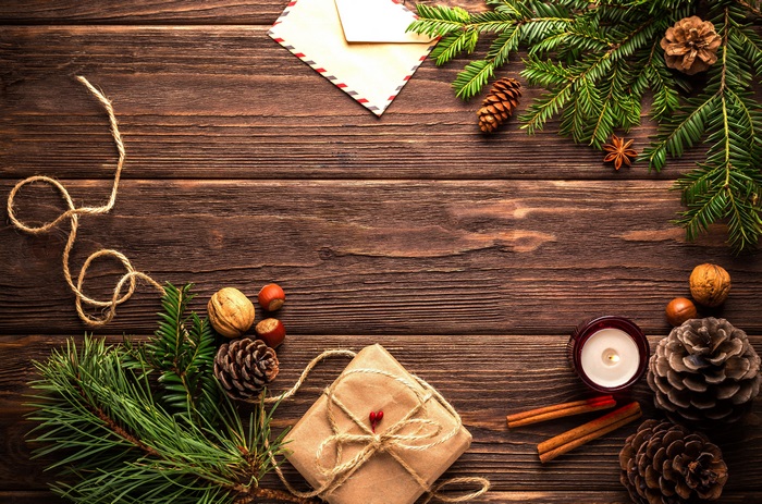Cozy Christmas Decorations with Candle and Pinecones