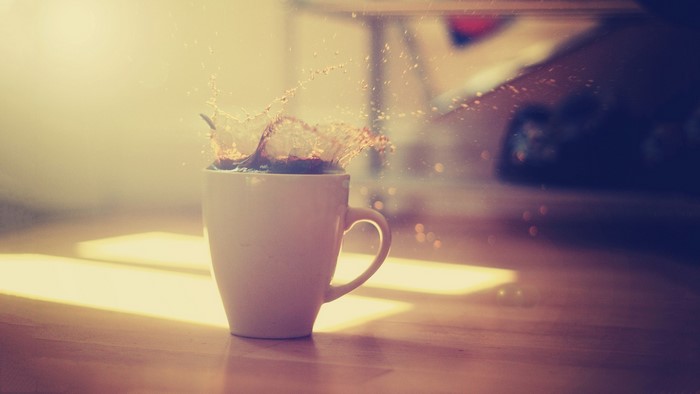 Coffee cup with splash