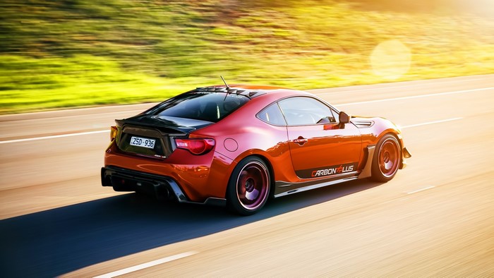 Red Toyota GT86 Tuning Car on Road