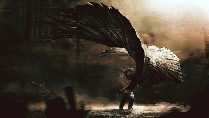 Angel with large dark wings in a desolate environment