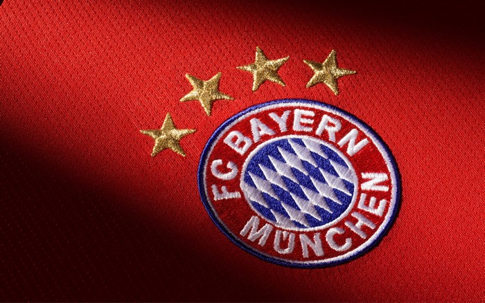 FC Bayern Munich logo with four stars on red jersey