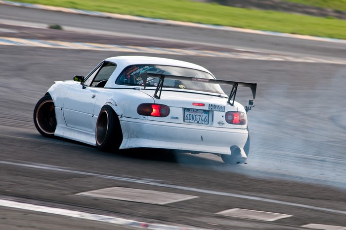 White Mazda MX-5 Drifting on Track
