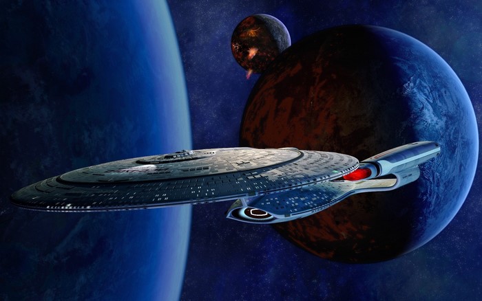 USS Enterprise from Star Trek in space with planets