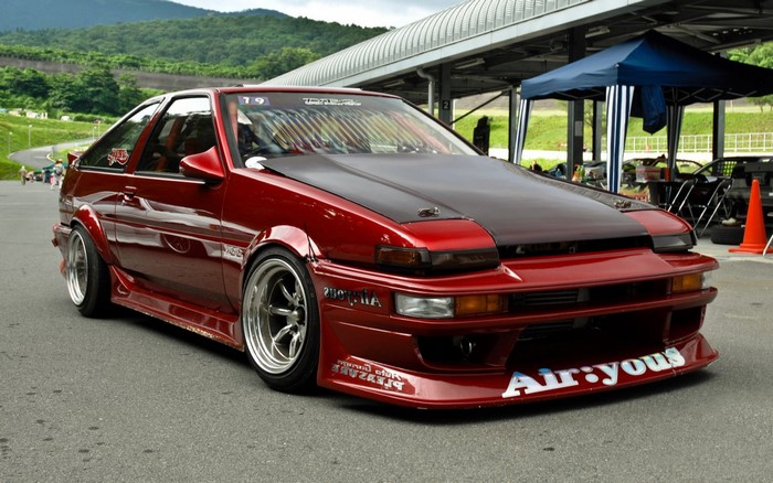 Red Toyota AE86 with custom body kit