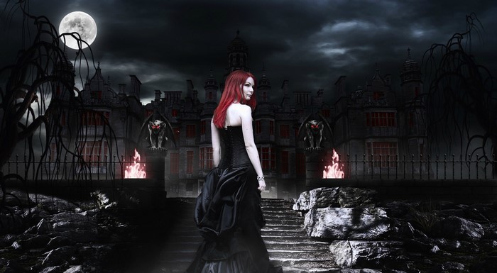 Gothic woman in black dress in front of haunted mansion