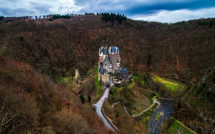 Eltz Castle Germany on a hill surrounded by forest