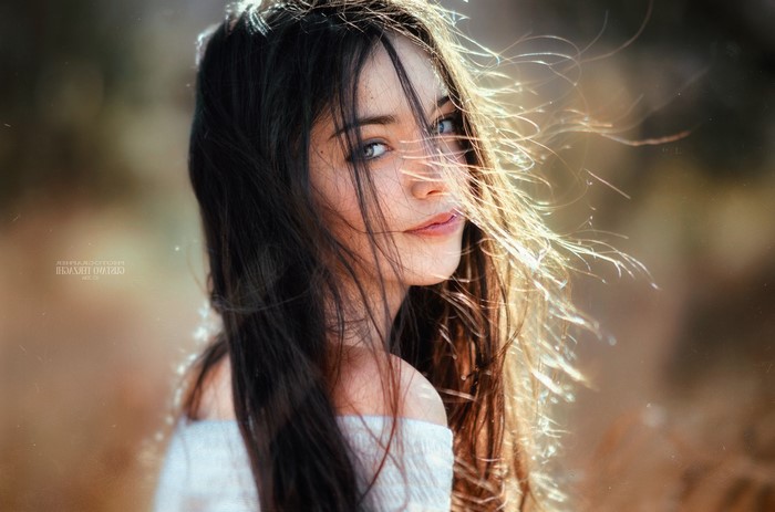Woman with Long Hair Outdoors in Soft Light