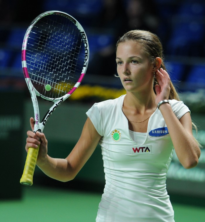 Anna Kalinskaya holding a tennis racket