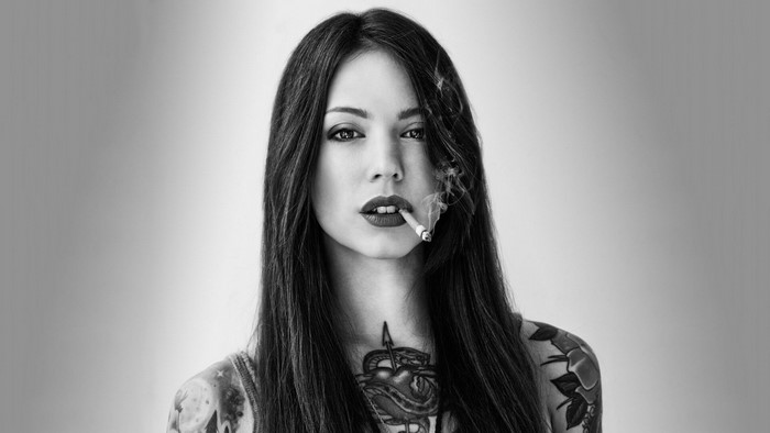 Monochrome Tattooed Woman Smoking