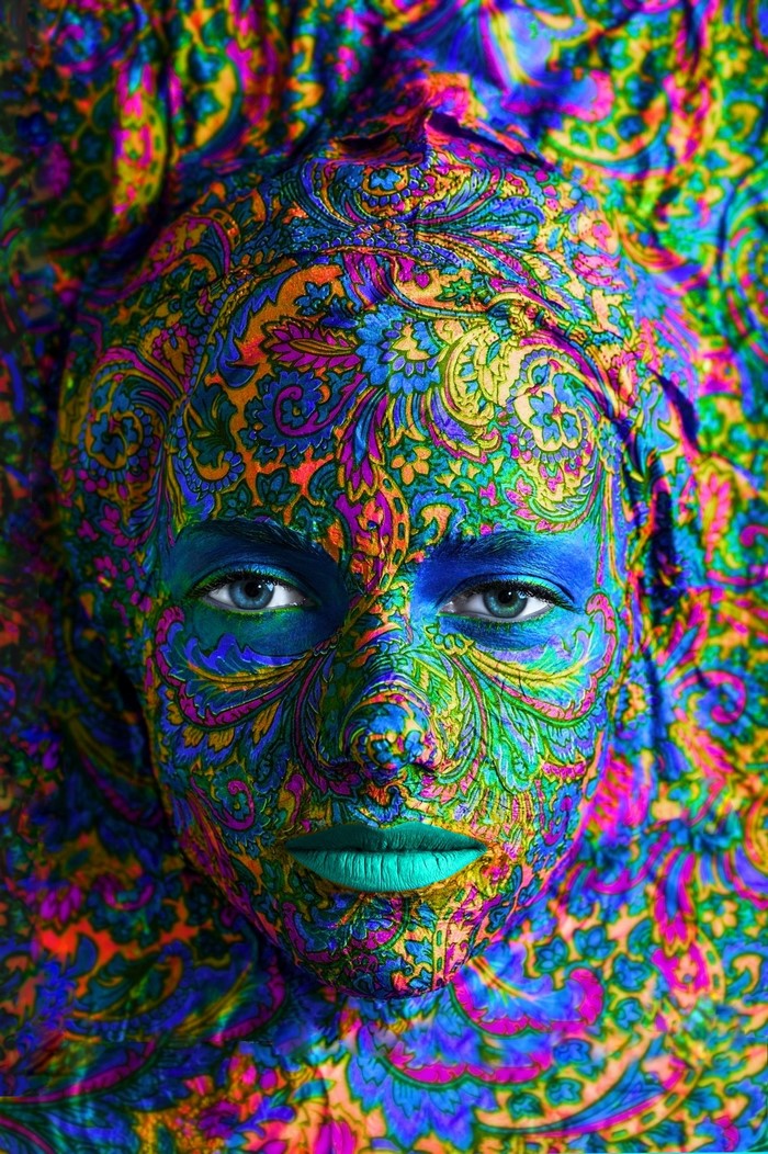 Woman with colorful paisley body paint