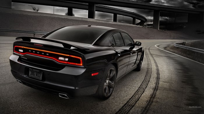 Black Dodge Charger on a Winding Road