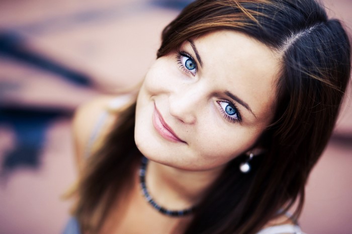 Woman with blue eyes smiling