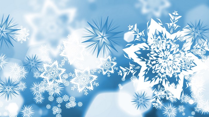 Blue winter snowflakes on a light blue background