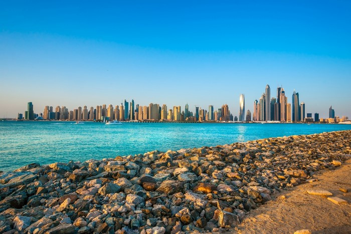 Dubai cityscape with skyscrapers and the sea