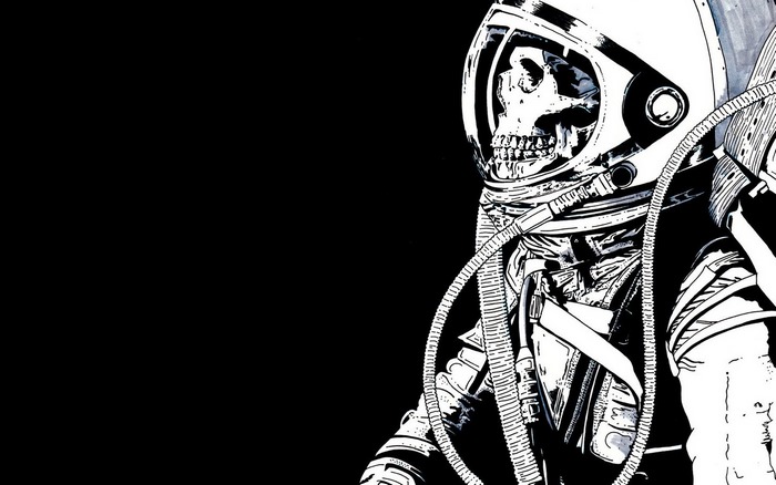 Skeleton astronaut in a spacesuit on a black background