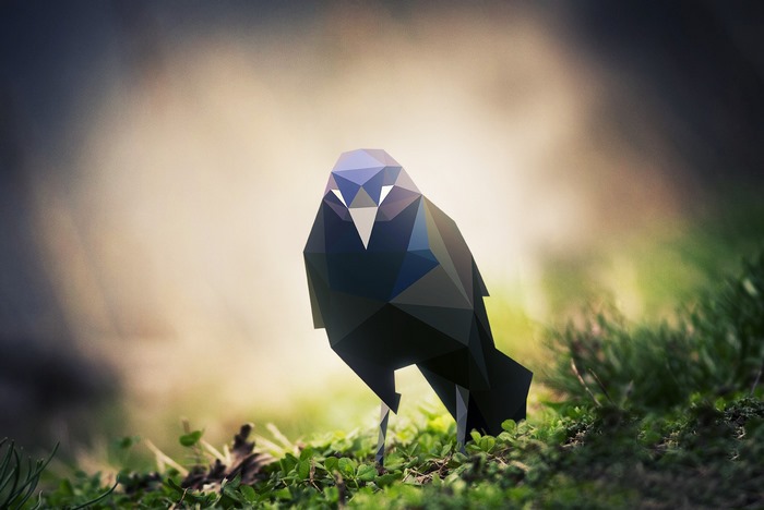 Low poly crow on grass with bokeh background