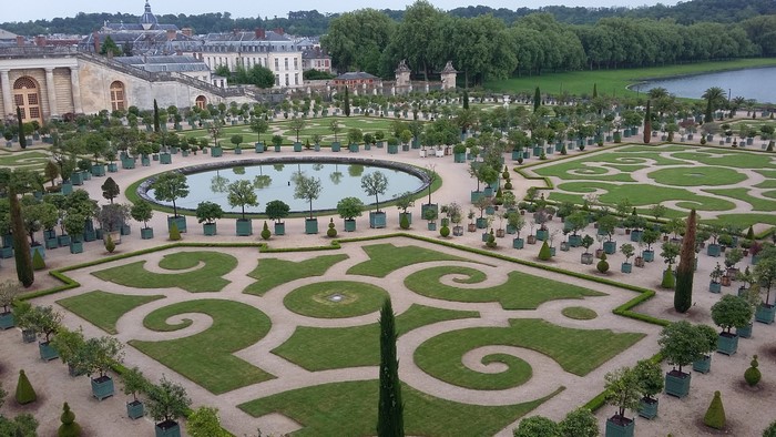 Palace of Versailles formal gardens with pond