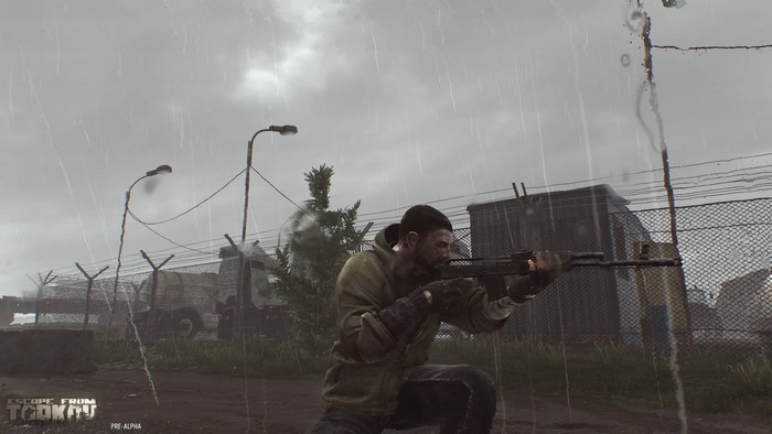 Man with rifle in Escape From Tarkov during rain