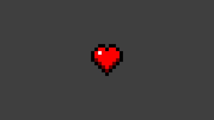 Pixel art red heart on a dark background
