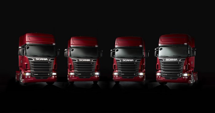 Four Red Scania Trucks