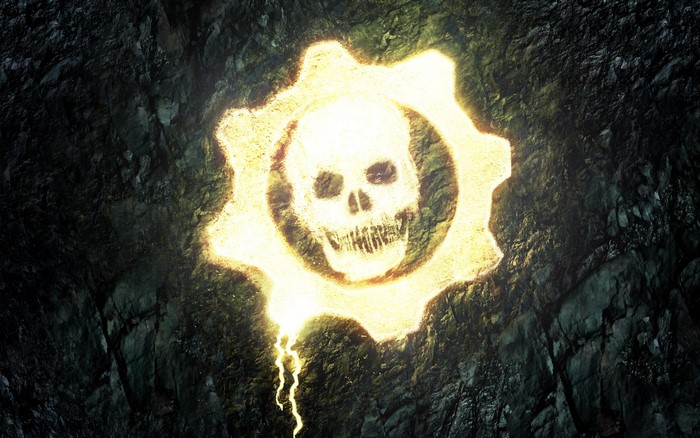 Gears of War skull logo on rocky surface