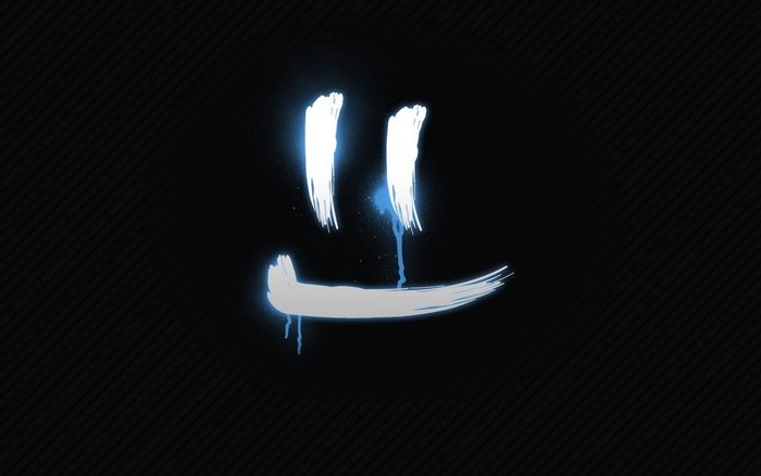 Smiley face logo with blue drips