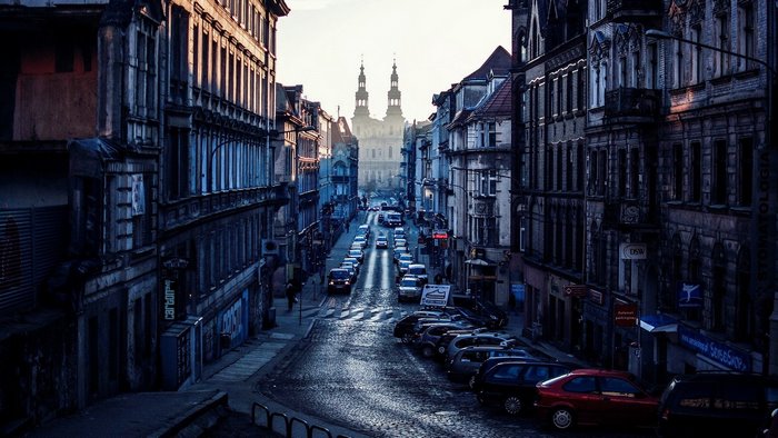 Street in Poznan, Poland with churches in the distance