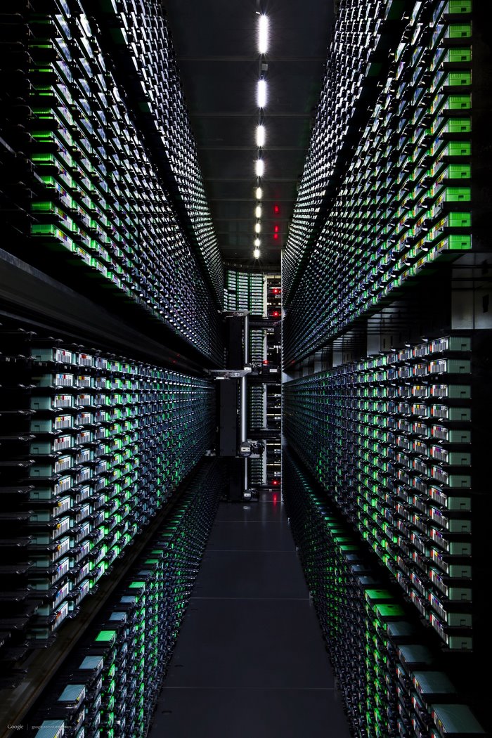 Google datacenter tape library with rows of servers