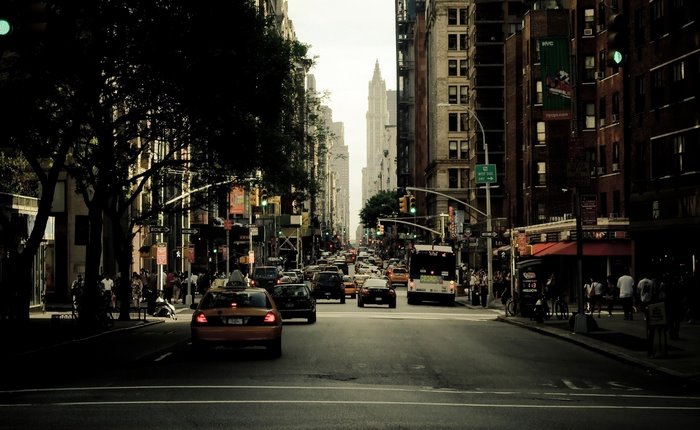 New York City street with traffic and buildings