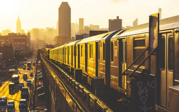 Elevated Train in New York City at Sunset